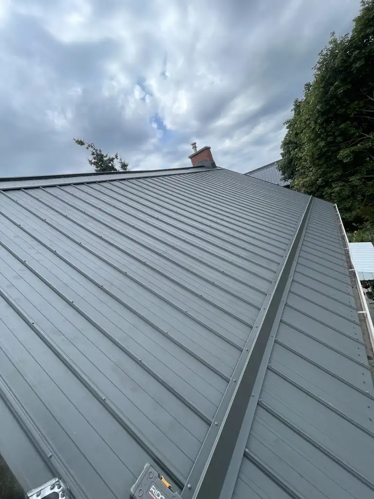 United Roofers crew completing a roofing project